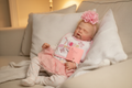 Angel asleep on a sofa