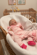 Anne in a wicker basket