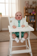 Arnie in a high chair