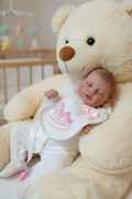 Betty asleep on teddy