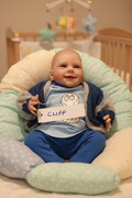 Cliff reborn doll on cushions