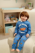 Reborn toddler boy doll on soft armchair
