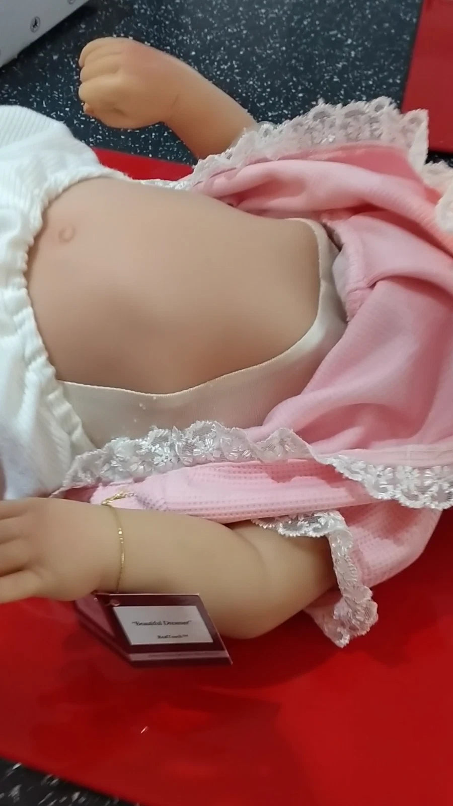 Beautiful Dreamer Ashton Drake doll that breathes if you gently rub her.