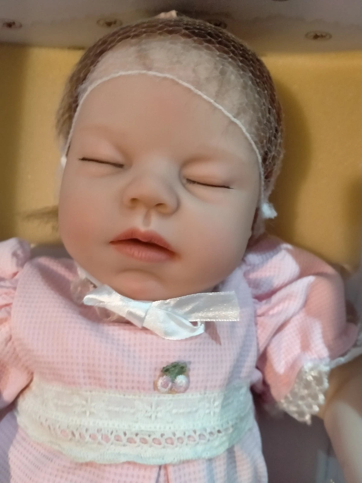 Beautiful Dreamer Ashton Drake doll that breathes if you gently rub her.