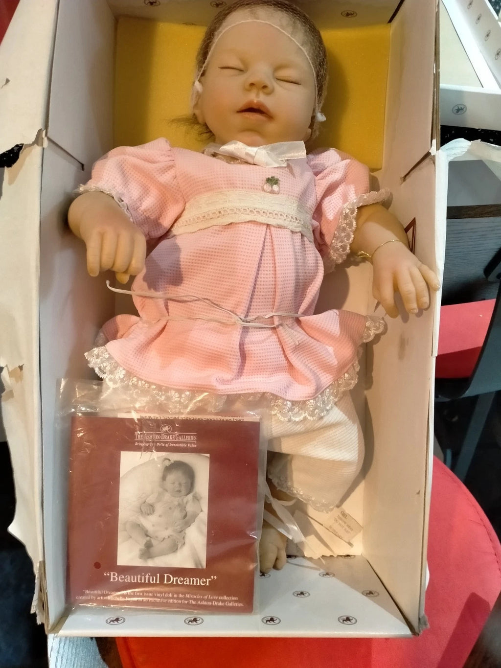 Beautiful Dreamer Ashton Drake doll that breathes if you gently rub her.
